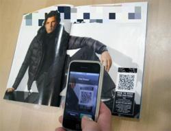 qAdverts Enhances Any Printed Ad